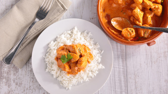 chicken cooked with curry and rice
